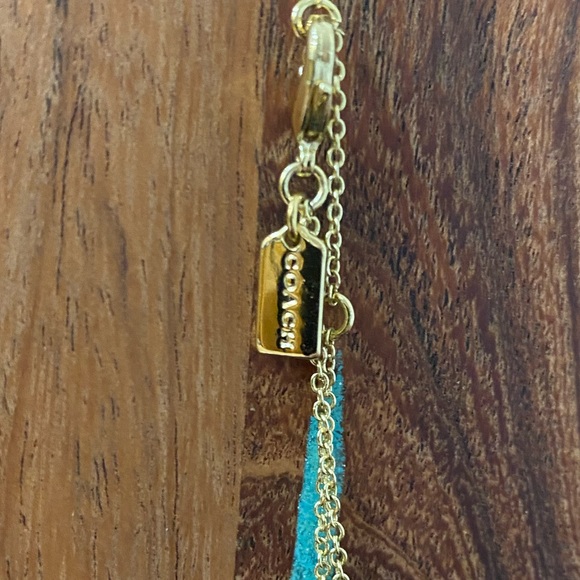 Gold COACH necklace with light pink gem. 16 in with 2 1-in extensions - Picture 2 of 3